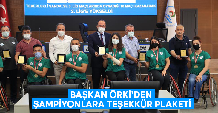 Başkan Örki’den şampiyonlara teşekkür plaketi